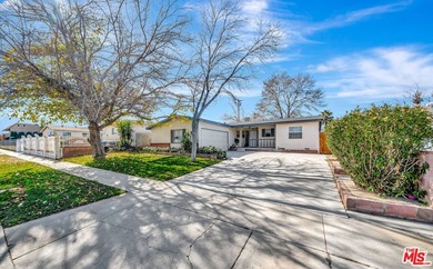 This charming single-story home blends mid-century character - photo 38