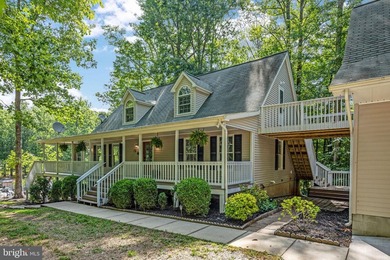 Welcome to this beautifully renovated waterfront retreat on the - photo 2