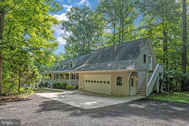 Welcome to this beautifully renovated waterfront retreat on the - photo 3