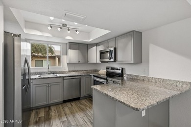 Welcome home to this rare and highly sought-after 3-bedroom - photo 1