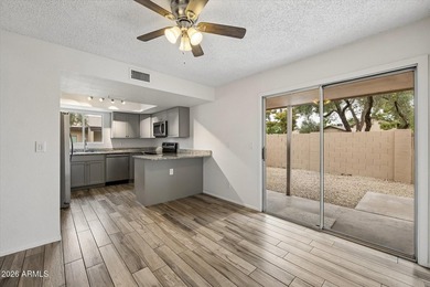 Welcome home to this rare and highly sought-after 3-bedroom - photo 2