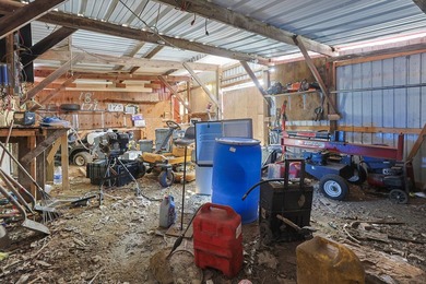MOTIVATED SELLER!!! Nestled on 4.65 scenic acres, this charming - photo 32