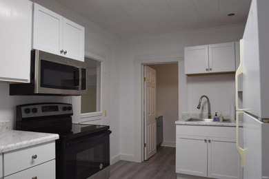 Recently remolded 3 bedroom, 1 bath home just 1 block from - photo 3