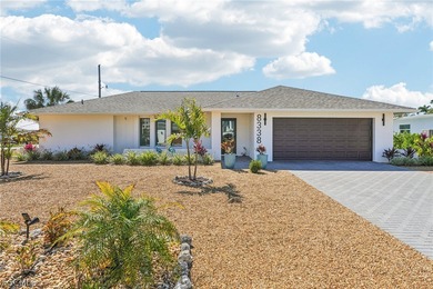 Stunning 3/2/2 waterfront pool home offering direct Gulf access - photo 1