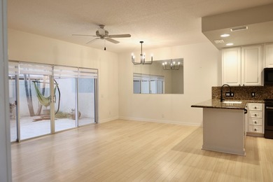 Nestled in the highly desirable Tequesta Oaks community, this - photo 2