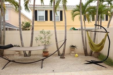 Nestled in the highly desirable Tequesta Oaks community, this - photo 10