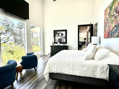 Completed in 2023, this Tennessee River Modern Masterpiece is - photo 12