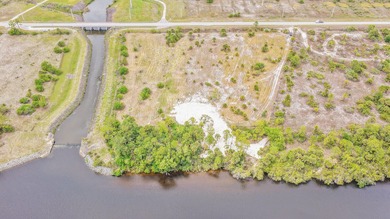 Set along 5+ pristine acres on the storied St. Lucie River, this - photo 12