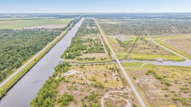 Set along 5+ pristine acres on the storied St. Lucie River, this - photo 27