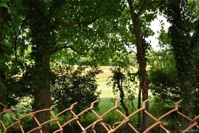 Tucked away at the end of a quiet cul-de-sac, this .62-acre - photo 5