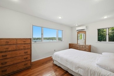 Nestled into the hillside with water views that hold through - photo 16