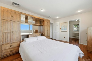 Nestled into the hillside with water views that hold through - photo 17