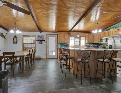Lakefront Living Meets Total Utility: Interior: Knotty Pine - photo 9