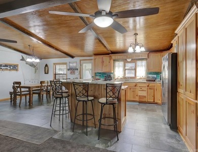 Lakefront Living Meets Total Utility: Interior: Knotty Pine - photo 10