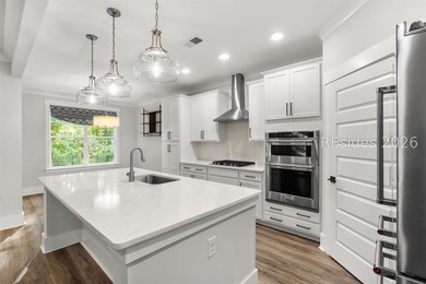 Tucked away on a private, wooded lot, this stunning single-story - photo 8