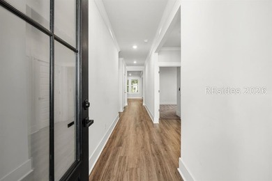 Tucked away on a private, wooded lot, this stunning single-story - photo 9