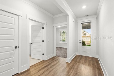 Tucked away on a private, wooded lot, this stunning single-story - photo 10