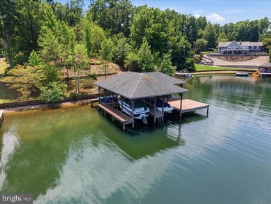 Remarkable waterfront lot! 3 stall Boathouse with huge sunning - photo 1