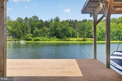 Remarkable waterfront lot! 3 stall Boathouse with huge sunning - photo 3