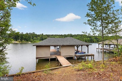 Remarkable waterfront lot! 3 stall Boathouse with huge sunning - photo 10
