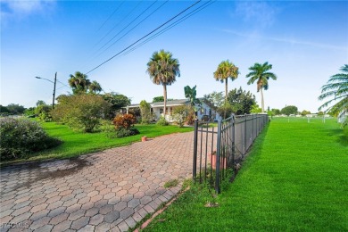 Lake Home For Sale in Lehigh Acres, Florida