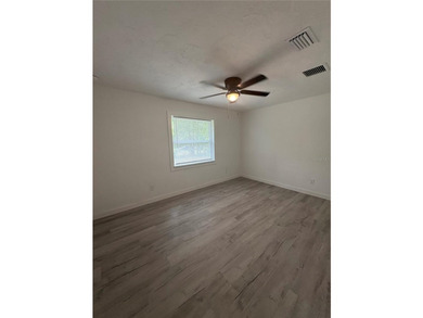 Welcome to this beautifully renovated 4-bedroom, 3-bath home - photo 12