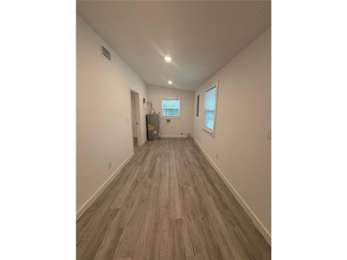 Welcome to this beautifully renovated 4-bedroom, 3-bath home - photo 16