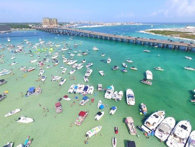Watch the boats drift by and soak in the vibrant energy of - photo 33