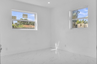 Priced to sell! Step into modern living with this freshly - photo 12