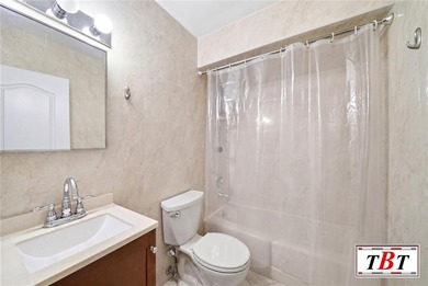 Welcome to 1555 East 13th Street! This colossal, impeccably - photo 17