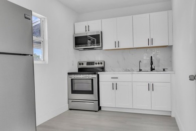 Priced to sell! Step into modern living with this freshly - photo 18
