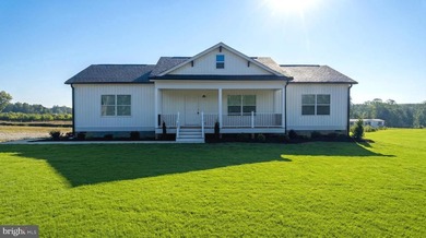 6.26 ACRES WITH POND ACCESS! Enjoy country living in this - photo 2