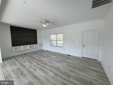 6.26 ACRES WITH POND ACCESS! Enjoy country living in this - photo 4