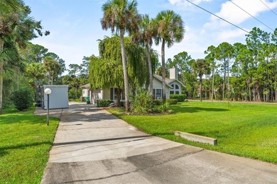 Nestled on 1.05 acres surrounded by nature, this 3BR/2BA home - photo 3