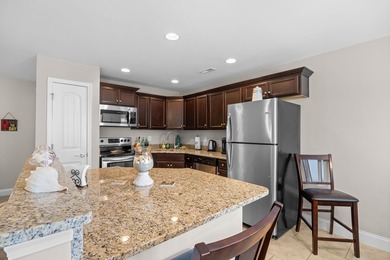 Welcome to this immaculate 2-bedroom, 2-bath TRUE townhome - photo 5