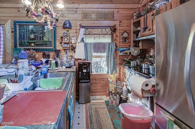 Don't miss this incredible value on a charming 2BR/2BA log cabin - photo 8