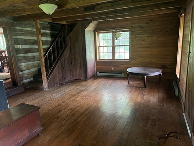 Older log home that has been rebuilt at the present location - photo 2
