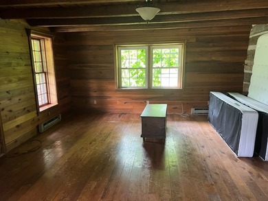 Older log home that has been rebuilt at the present location - photo 3
