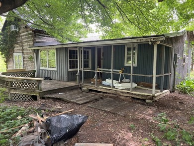 Older log home that has been rebuilt at the present location - photo 9