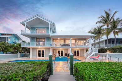 Enjoy this OPEN WATER luxury lifestyle in the coveted area of - photo 4