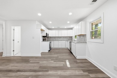 Welcome home to this beautifully remodeled 3-bedroom, 2 - photo 9