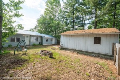 Lake Home For Sale in Prudenville, Michigan