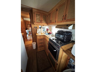 Enjoy the best of lake living with this unique and versatile - photo 20