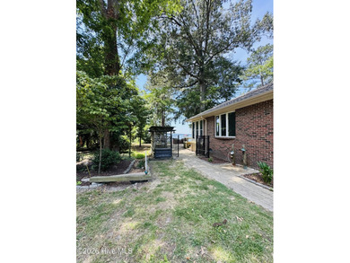 Nestled on two waterfront lots with sweeping views and direct - photo 50