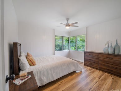 Tucked into the lush, tropical setting of Manoa Valley, this - photo 6