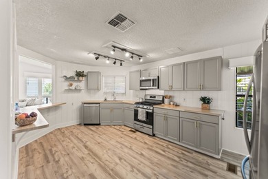 Enjoy resortstyle coastal living in one of Huntington Beach's - photo 1