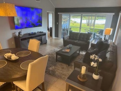 End Unit villa features beautiful lakefront views with vaulted - photo 3