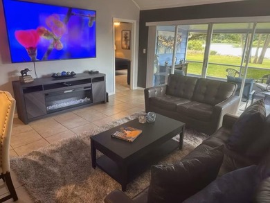 End Unit villa features beautiful lakefront views with vaulted - photo 4