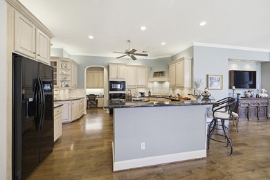 Located in the highly sought-after guarded and gated golf course - photo 11