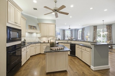 Located in the highly sought-after guarded and gated golf course - photo 14
